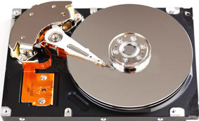 Spinning hard drive with cover removed.